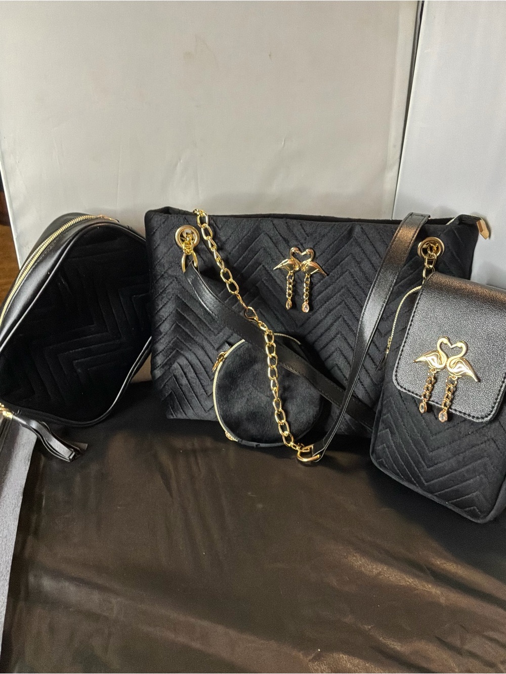Black Quilted Shoulder Bag with Gold Chain Accents - Picture 3 of 3